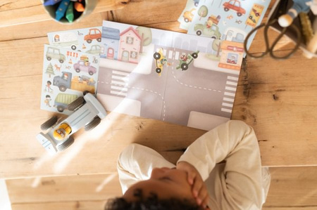 Little Dutch Książeczka z naklejkami Jim na ulicy