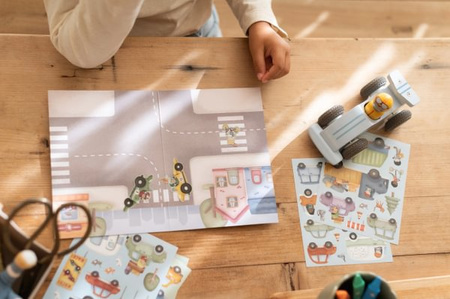 Little Dutch Książeczka z naklejkami Jim na ulicy